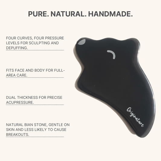 Black gua sha tool with text describing its features on a white background